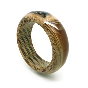 Plastic bangle in verschillende bruintinten