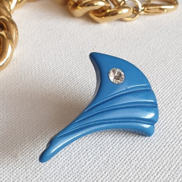 Plastic blue leaf brooch with clear rhinestone