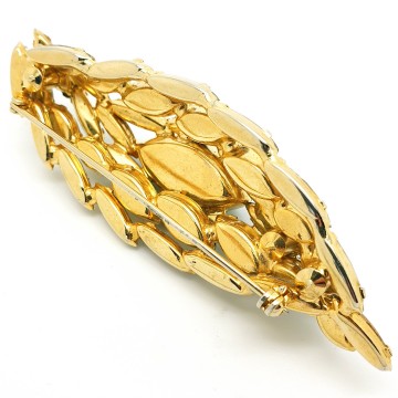 Layered domed brooch with green and clear navette faceted glass stones - Bliinkt