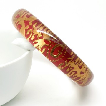 Red golden 'G' bangle