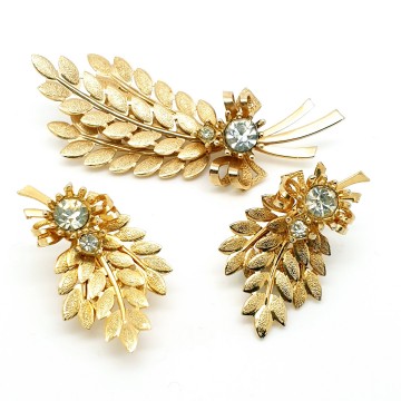 Sarah Coventry 1960 'Harvest Time' goudkleurige broche en oorbellen