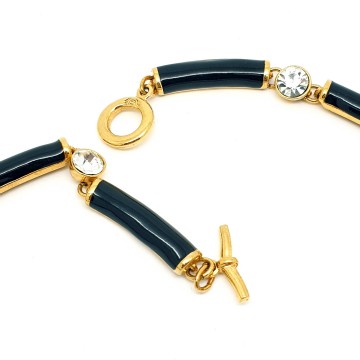 Short goldtone necklace with black enamel links and clear rhinestones signed N with crown - Bliinkt