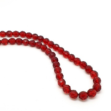 Necklace with red facetted glass beads