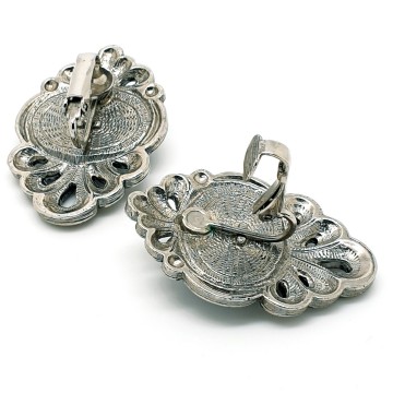 Silvertone earrings with lapis blue facetted cabochons and marcasites