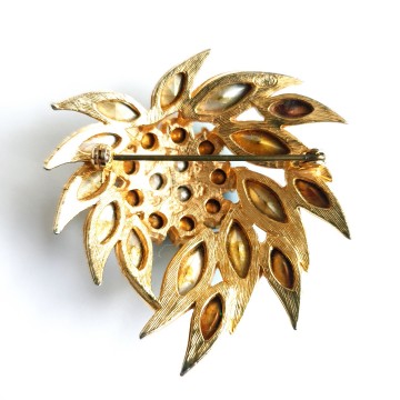 Sphinx - emerald green and aurora borealis rhinestone brooch - Bliinkt