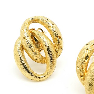 Sphinx goldtone intertwined ovals clip earrings - Bliinkt