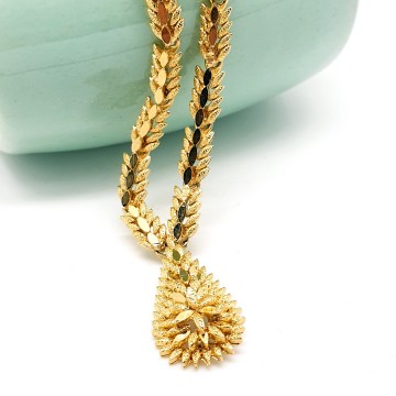 Sphinx goldtone necklace brutalist