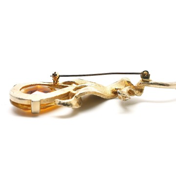 Sphinx goldtone brooch with large faceted glass stone and clear rhinestones - Bliinkt