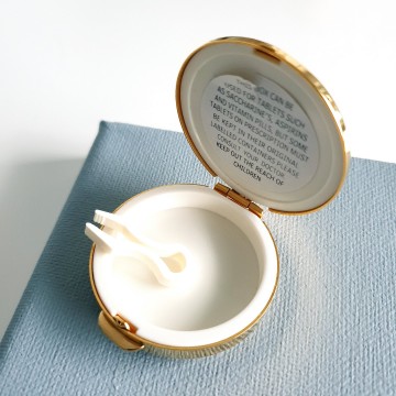 Stratton - goldtone pill box with multicolour rhinestones - Bliinkt