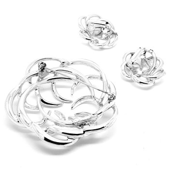 Sarah Coventry 'Tailored Swirl' 1973 silvertone brooch and earring set