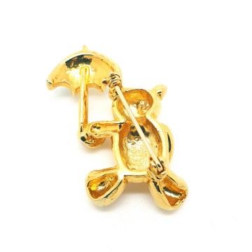Goldtone teddybear brooch with green rhinestone eyes and umbrella - Bliinkt