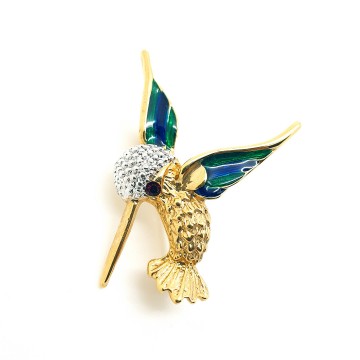 Tiny goldtone hummingbird brooch with green and blue enamelled wings - Bliinkt