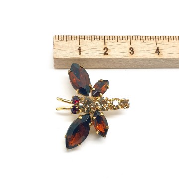 Tiny insect brooch with brown rhinestone wings red eyes and champaign coloured body size   bliinkt