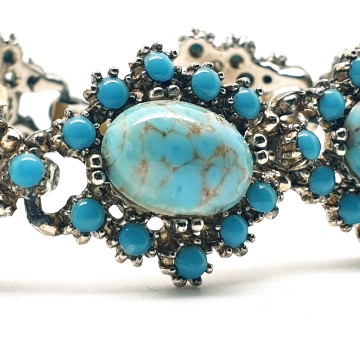Vintage schakelarmband met turquoise cabochons - Bliinkt