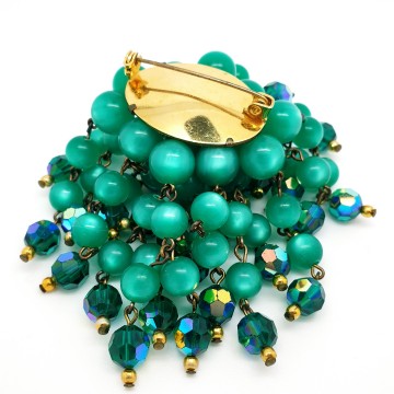 Watervalbroche met groene 'moonglow' en aurora borealiskralen