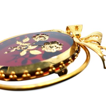 Western Germany goldtone brooch with red and gold intaglio rose and filigree