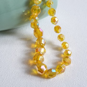 Ketting met gele facetgeslepen aurora borealis glaskralen